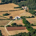 A breathtaking aerial view of farmland in Ciutadella, showcasing Spanish countryside beauty.
