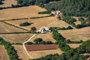 A breathtaking aerial view of farmland in Ciutadella, showcasing Spanish countryside beauty.